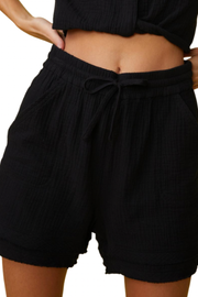 Image of model wearing Monrow gauze black shorts
