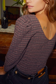 Image of model wearing Nation LTD Aurora blouse in Tartan