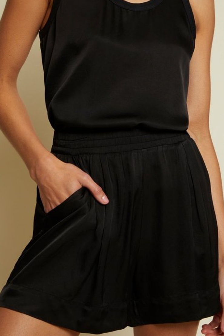 Image of model wearing Nation LTD London shorts in black
