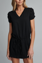 Images of model wearing Sundays Geneve dress in black