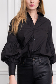 Image of model wearing The shirt Molly shirt in black